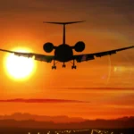 airplane-landing-private-jet-silhouette-090496833_prevstill